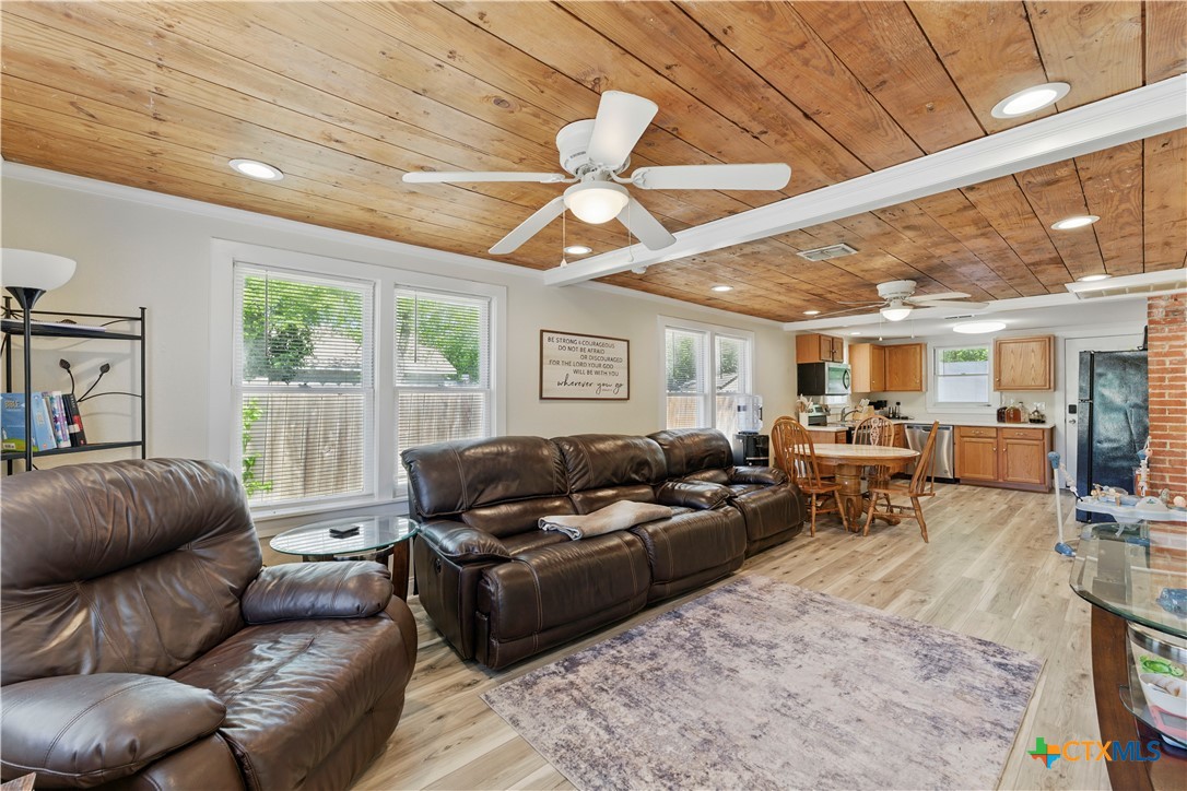 411 Ellis Street Seguin, TX 78155 - Photo 3 of 28 a living room with furniture and a large window