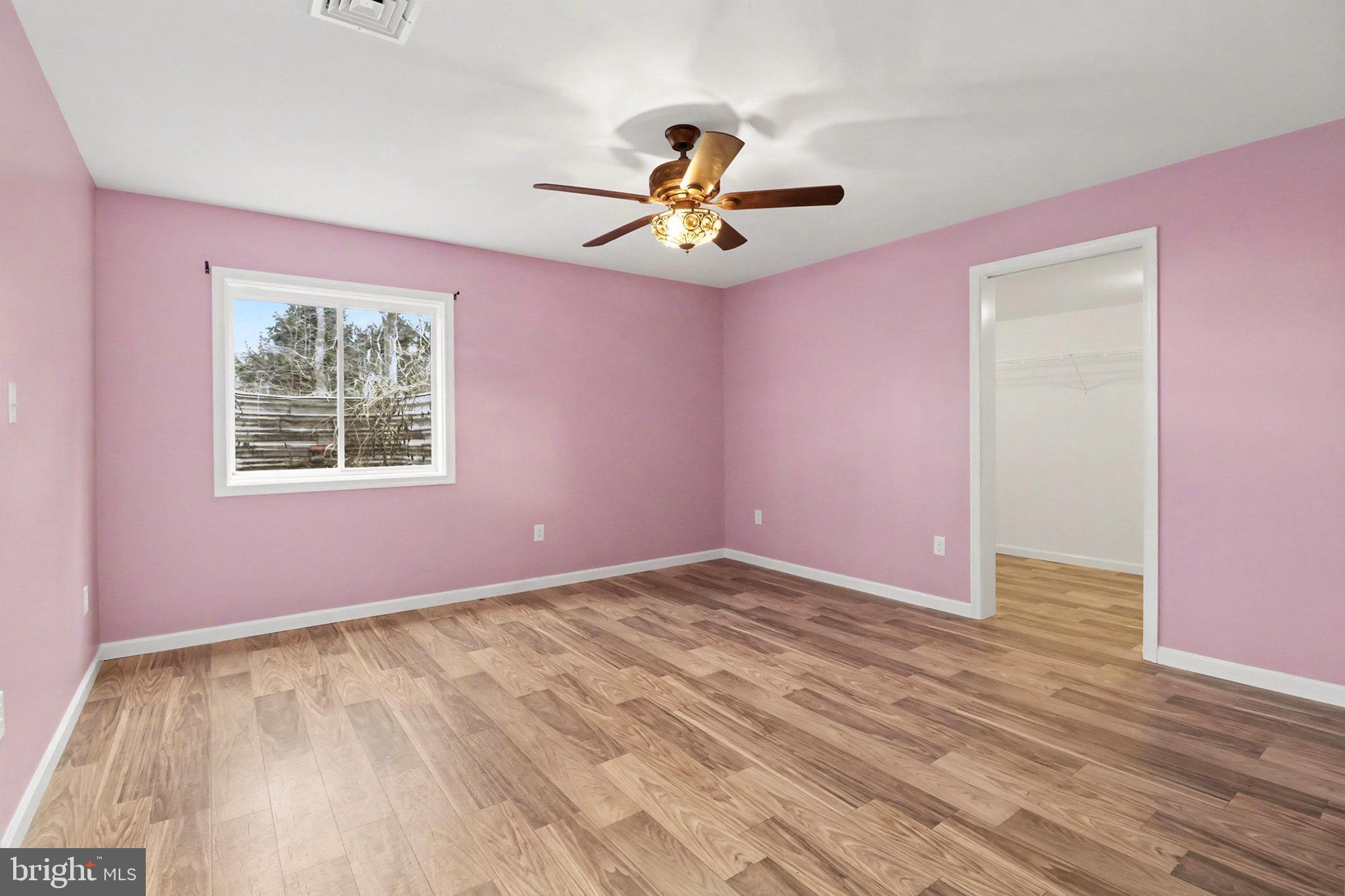1296 Bower Road Shermans Dale, PA 17090 - Photo 34 of 43 a view of an empty room with window and wooden floor