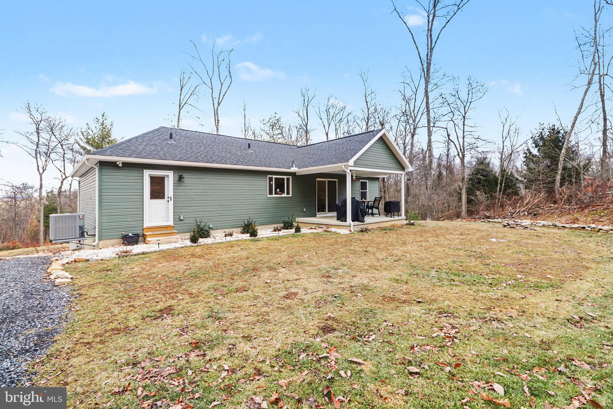 1296 Bower Road Shermans Dale, PA 17090 - Photo 4 of 43 a front view of a house with a yard