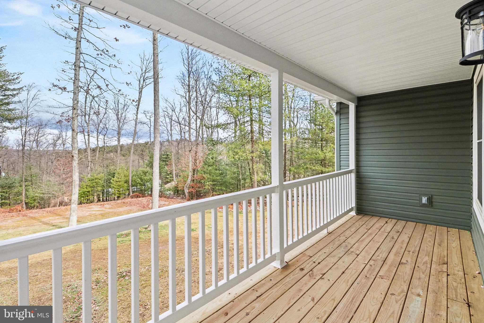 1296 Bower Road Shermans Dale, PA 17090 - Photo 7 of 43 a view of wooden balcony with wooden floor