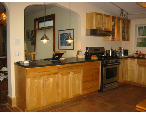 89 Riverside Drive Northampton, MA 01062 - Photo 6 of 17 a kitchen with stainless steel appliances granite countertop a stove a sink and a microwave
