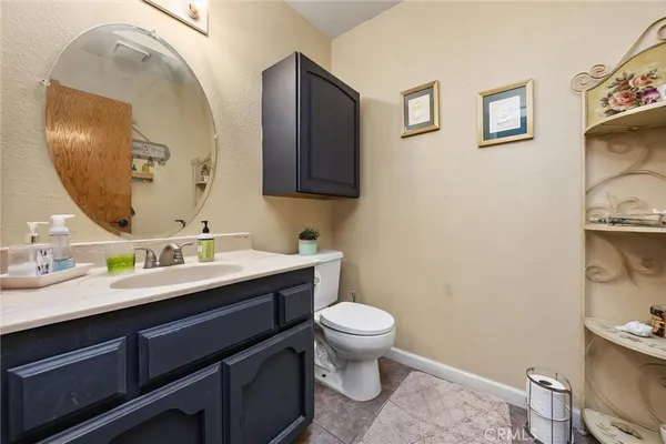 a bathroom with a sink a mirror and a bathtub