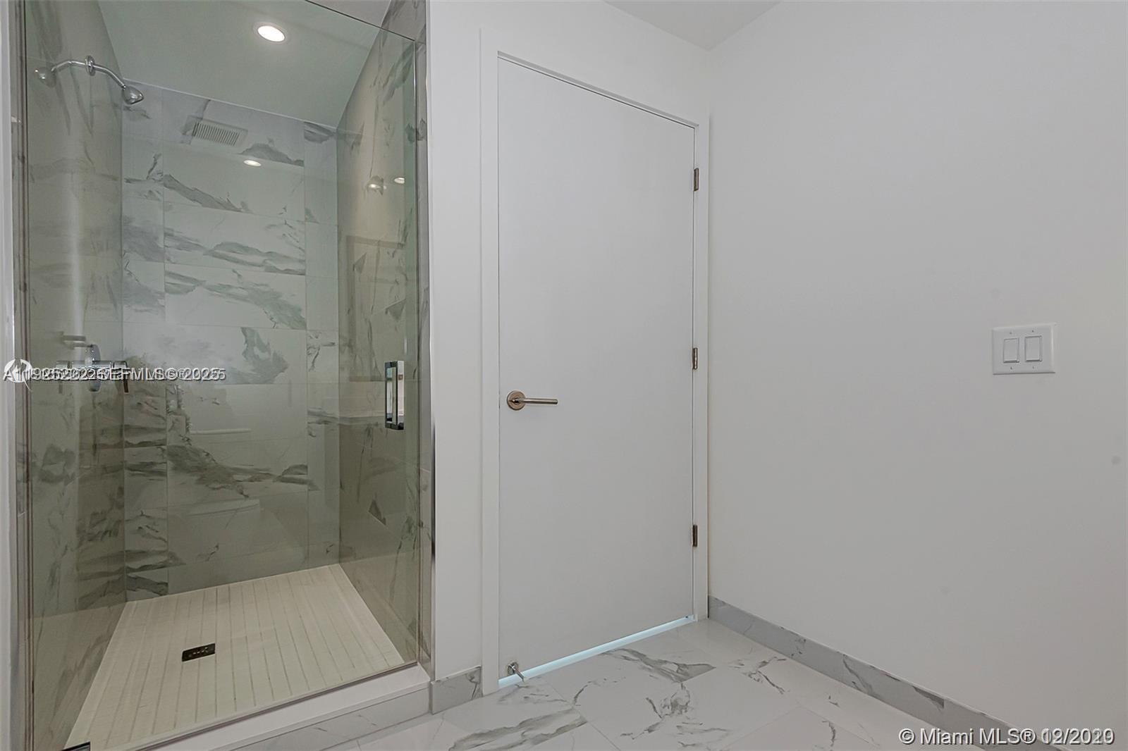 851 Northeast 1st Avenue, Unit 1608 Miami, FL 33132 - Photo 7 of 34 a bathroom with a shower