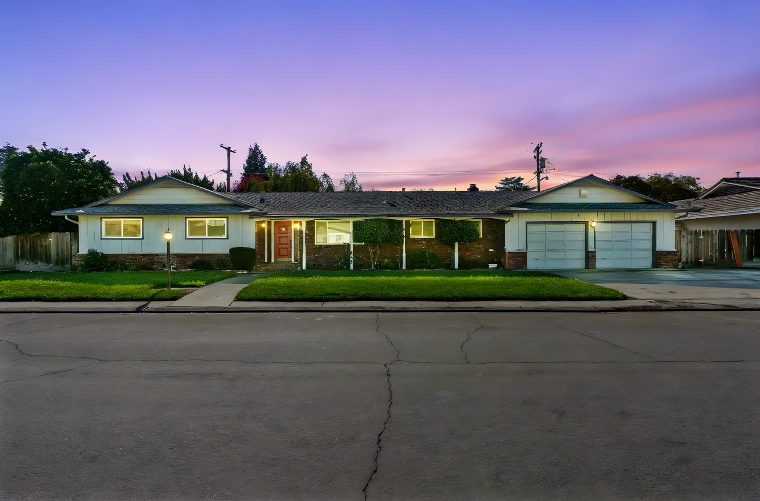 front view of a house with a yard