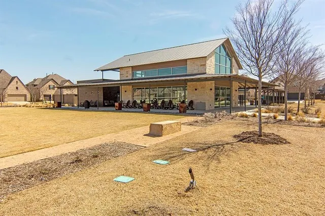 a view of a backyard of a house