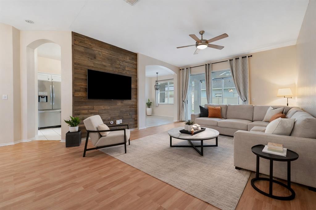 1073 Turtle Lake Court Ocoee, FL 34761 - Photo 16 of 46 a living room with furniture and a fireplace