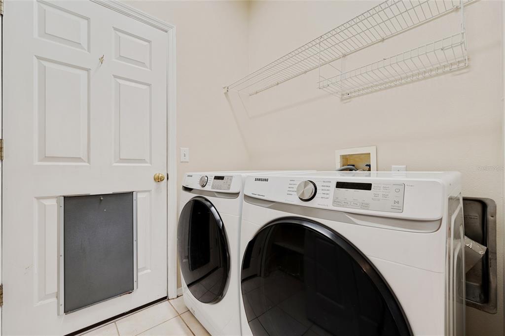 1073 Turtle Lake Court Ocoee, FL 34761 - Photo 39 of 46 a utility room with dryer and washer