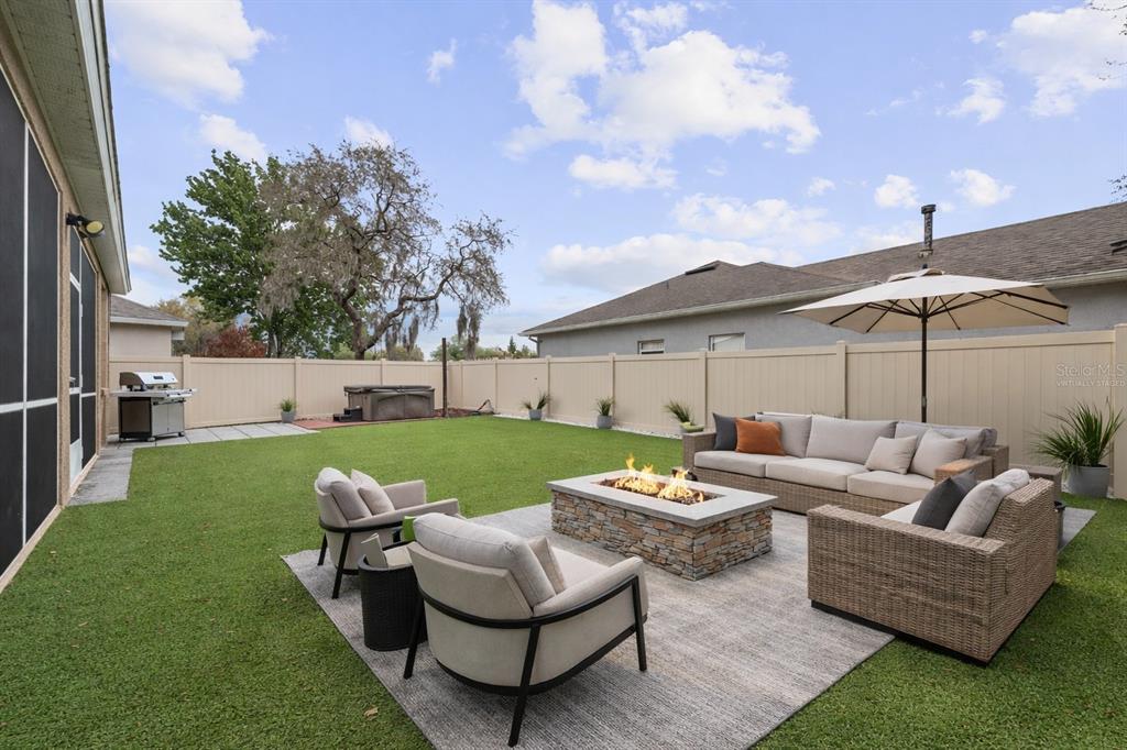 1073 Turtle Lake Court Ocoee, FL 34761 - Photo 7 of 46 a outdoor living space with furniture and garden