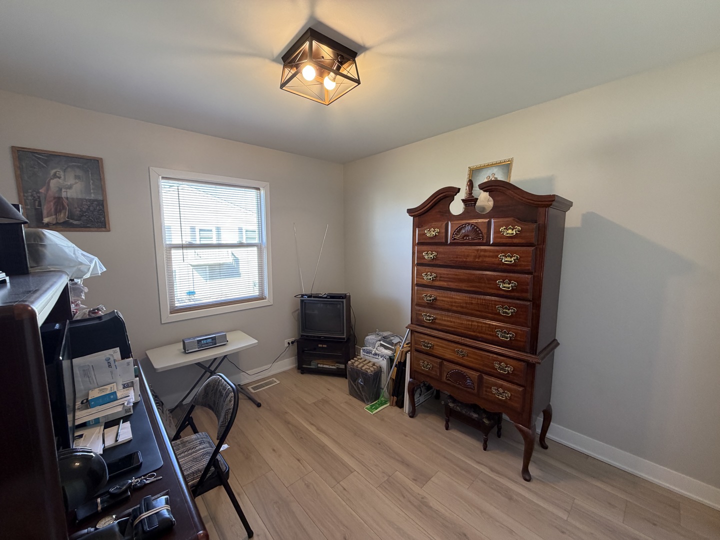 335 David Court, Unit B Bartlett, IL 60103 - Photo 13 of 16 a view of a workspace with furniture and a window