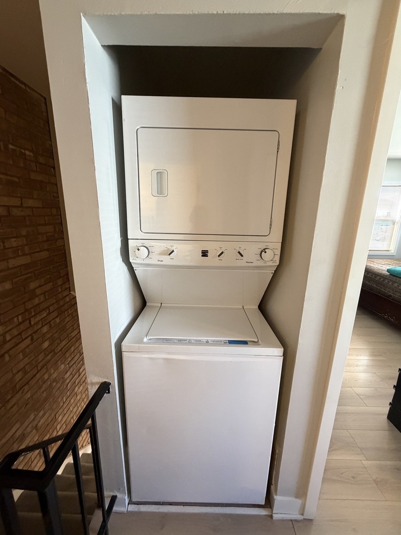 335 David Court, Unit B Bartlett, IL 60103 - Photo 15 of 16 a utility room with dryer and washer
