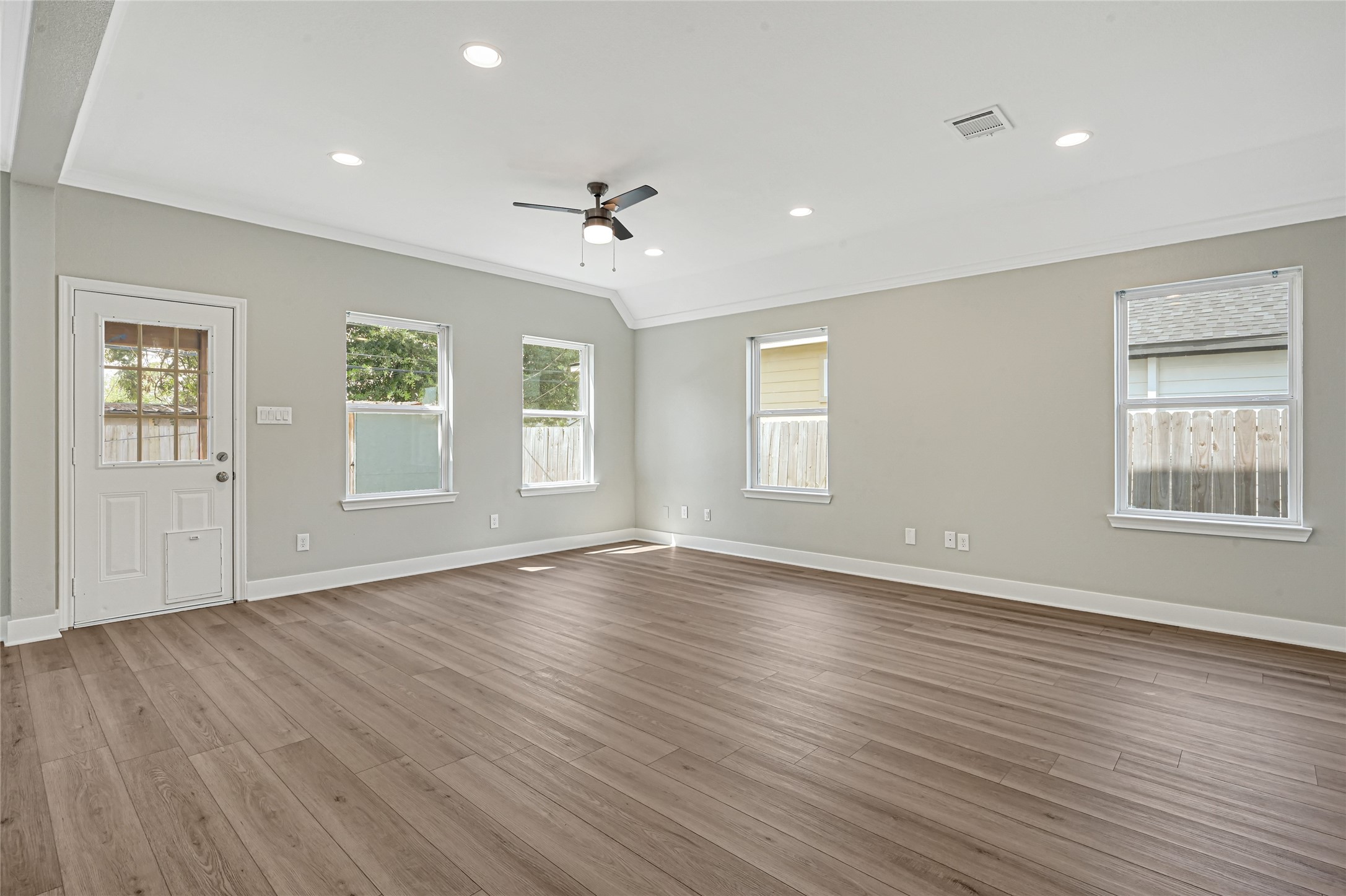 9823 Bamboo Road, Unit B Houston, TX 77041 - Photo 9 of 33 Open-concept layout connecting the kitchen with the dining and living spaces.