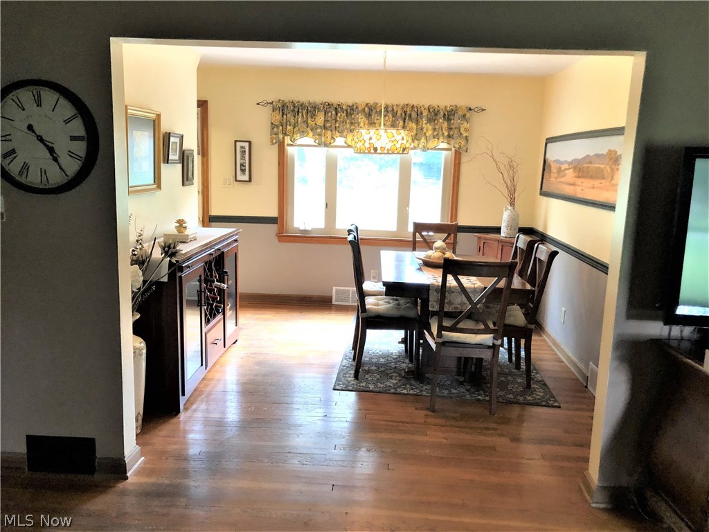 2980 Pontius Road Uniontown, OH 44685 - Photo 6 of 32 Lot's of natural light and beautiful hardwood floor in the dining room.