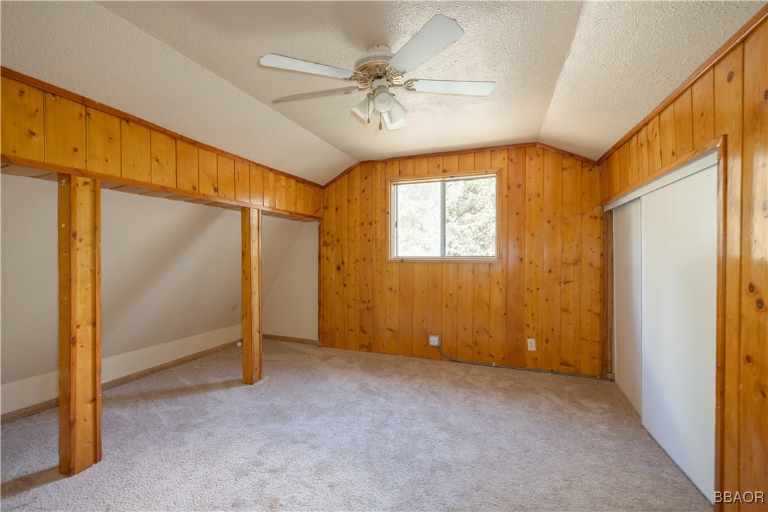 809 San Bernardino Avenue Sugarloaf, CA 92386 - Photo 11 of 23 a view of an empty room with a window