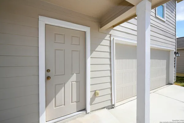a view of front door with hallway