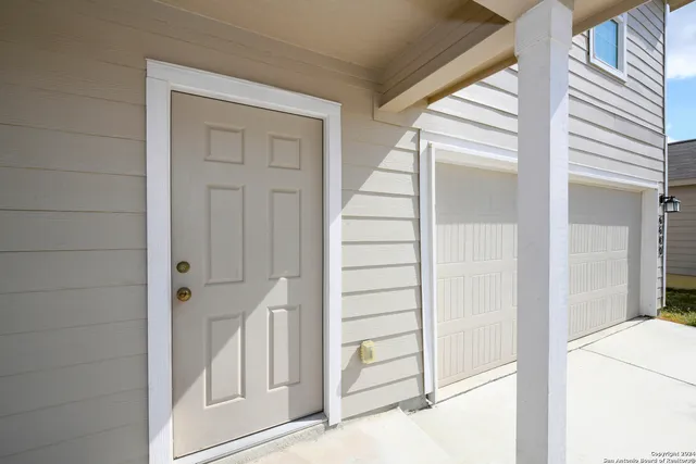 a view of front door with hallway