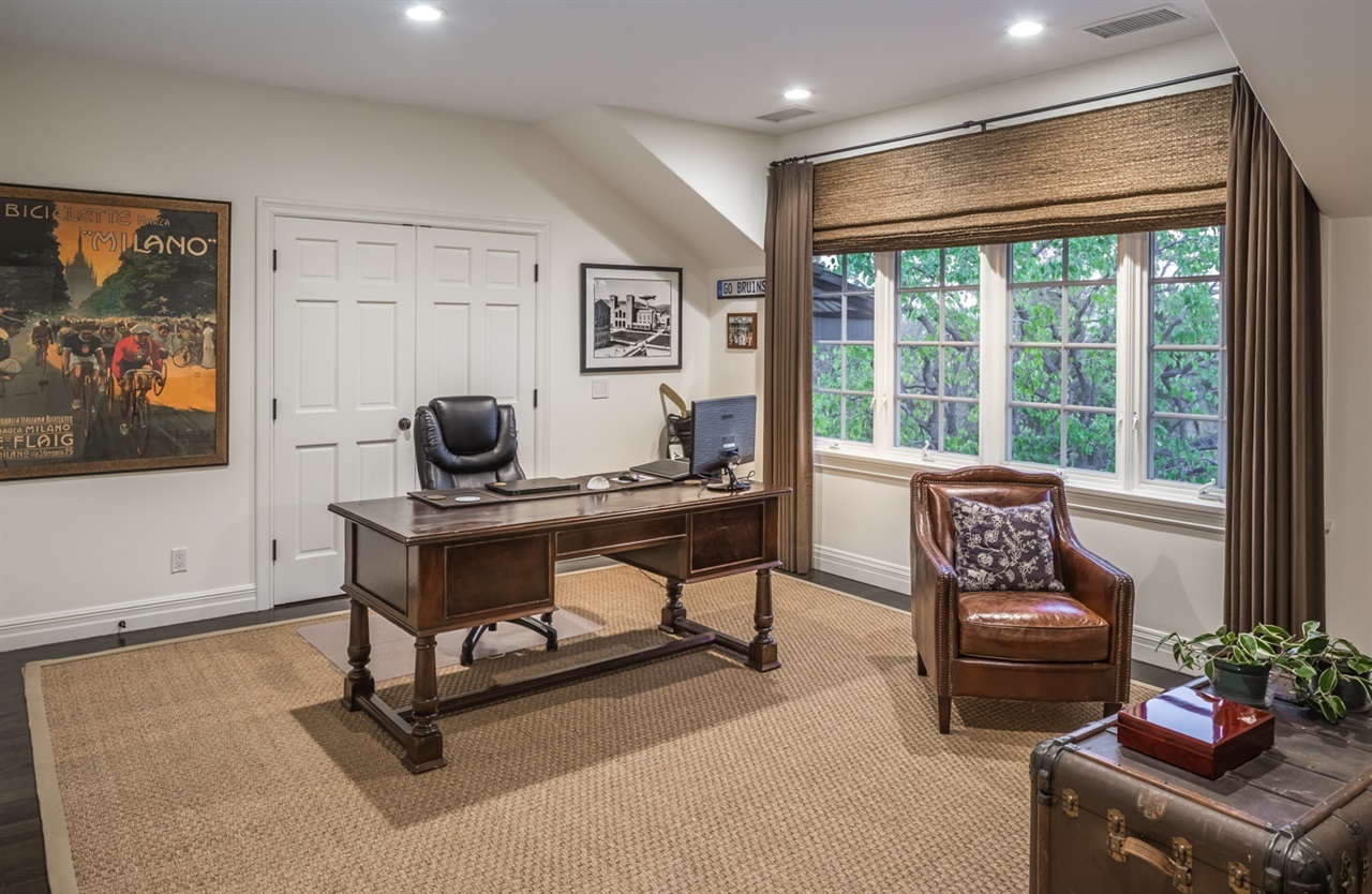 6003 La Flecha Rancho Santa Fe, CA 92067 - Photo 13 of 23 There are two beautiful office spaces in this stunning home. This is the executive office and it has a lovely sitting area and hidden storage area. You will enjoy scenic Views from the windows, as you sit at the desk.