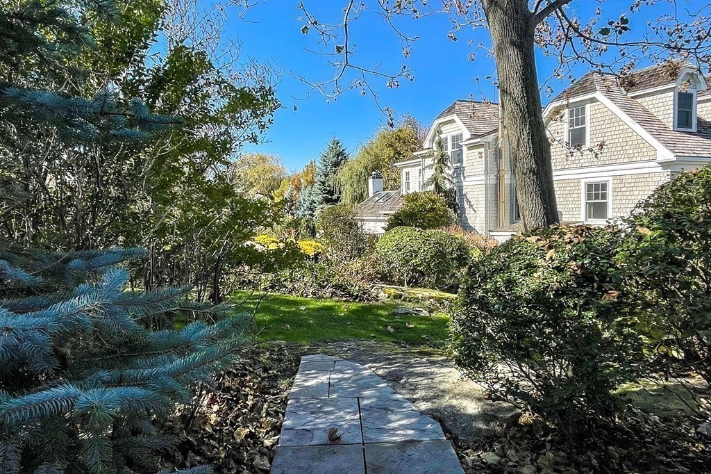 363 Jerusalem Road Cohasset, MA 02025 - Photo 13 of 42 a front view of a house with a yard
