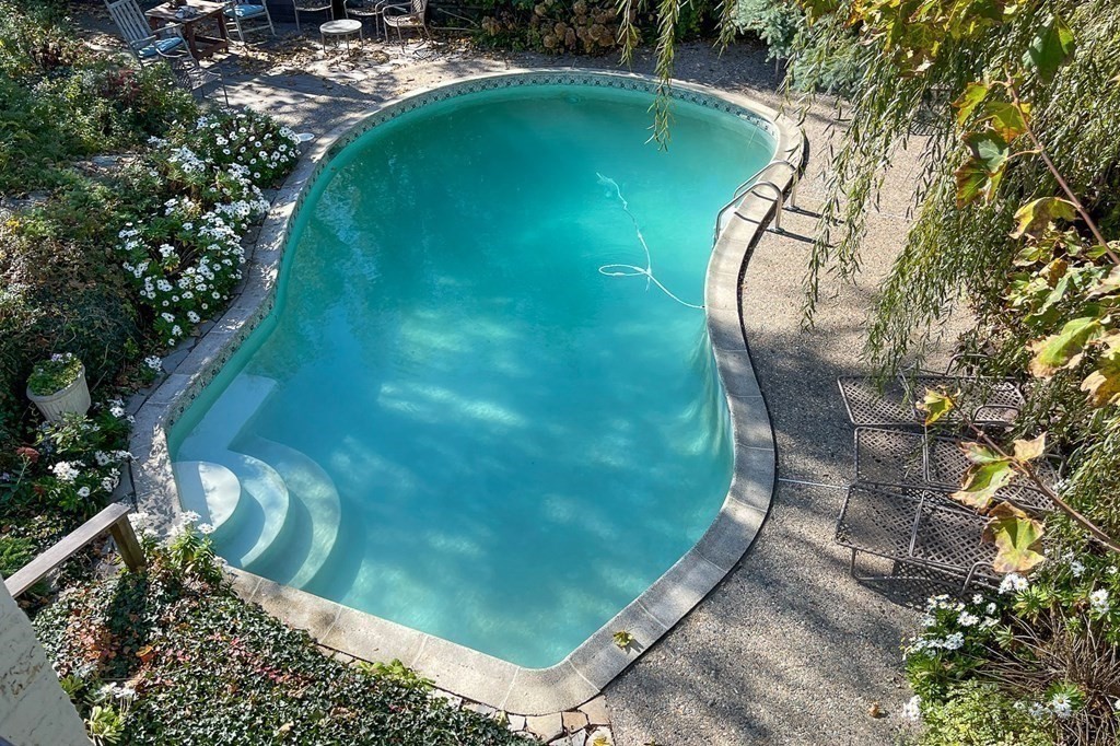 363 Jerusalem Road Cohasset, MA 02025 - Photo 15 of 42 a view of a swimming pool with a yard and outdoor seating