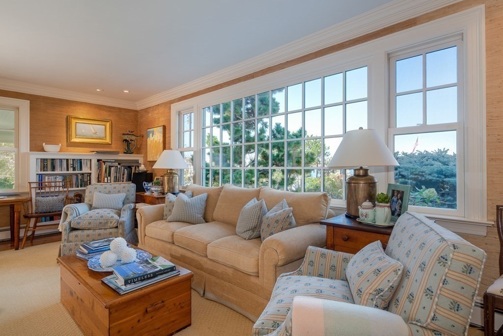 363 Jerusalem Road Cohasset, MA 02025 - Photo 17 of 42 a living room with furniture and a large window
