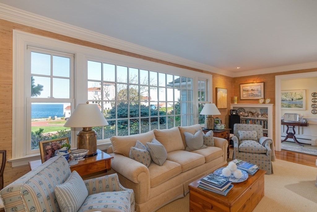 363 Jerusalem Road Cohasset, MA 02025 - Photo 18 of 42 a living room with furniture and a large window