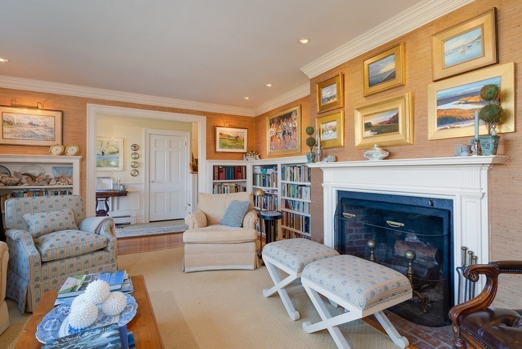 363 Jerusalem Road Cohasset, MA 02025 - Photo 19 of 42 a living room with furniture and a fireplace