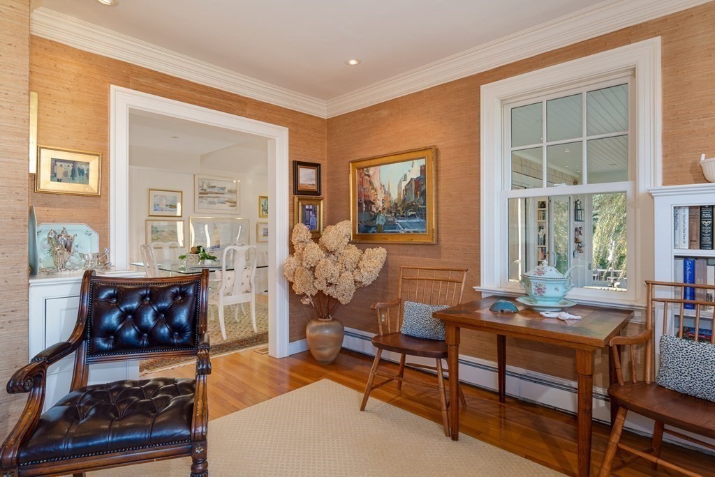 363 Jerusalem Road Cohasset, MA 02025 - Photo 20 of 42 a living room with furniture and a fireplace