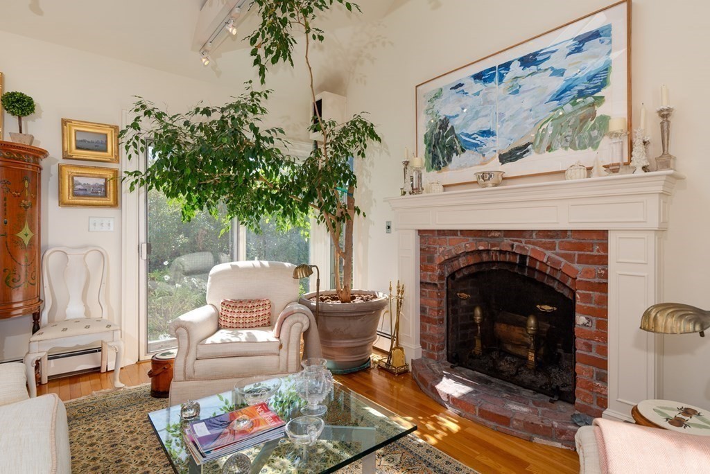 363 Jerusalem Road Cohasset, MA 02025 - Photo 21 of 42 a living room with furniture and a fireplace