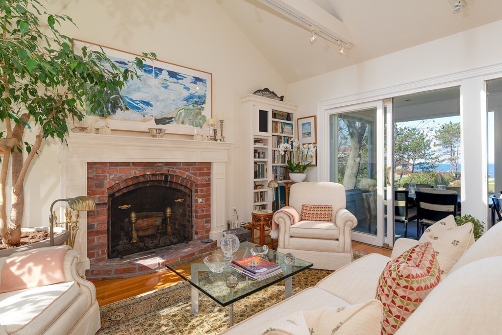 363 Jerusalem Road Cohasset, MA 02025 - Photo 22 of 42 a living room with furniture and a fireplace
