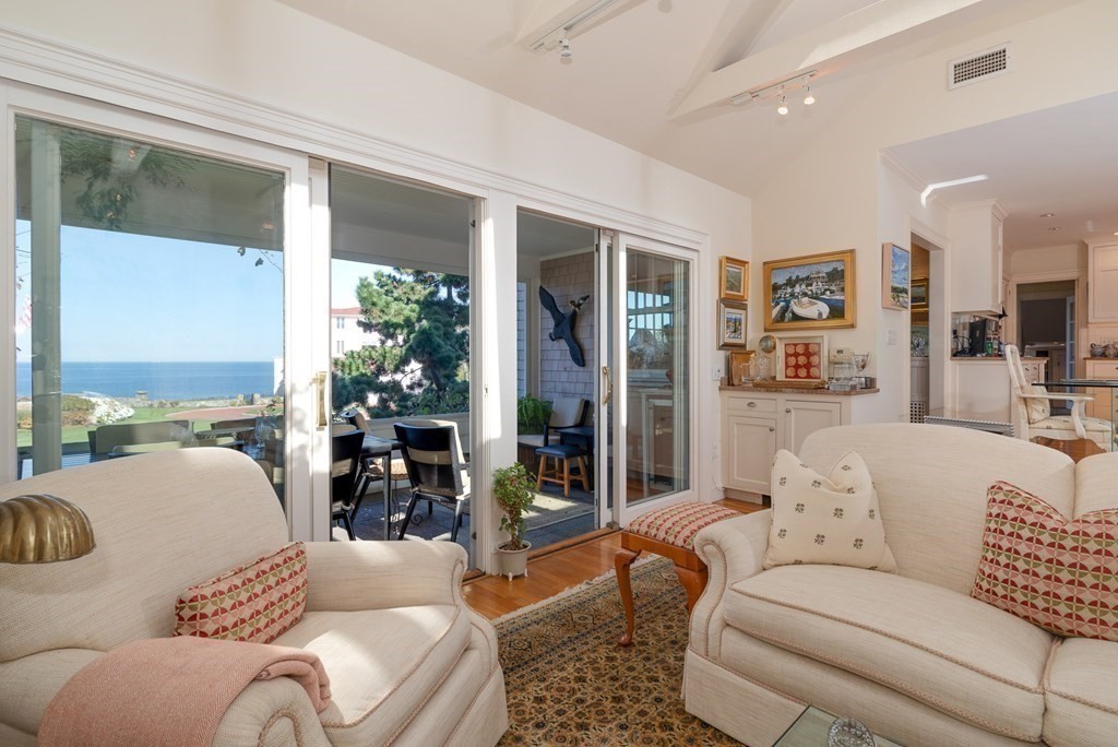 363 Jerusalem Road Cohasset, MA 02025 - Photo 23 of 42 a living room with furniture and a large window