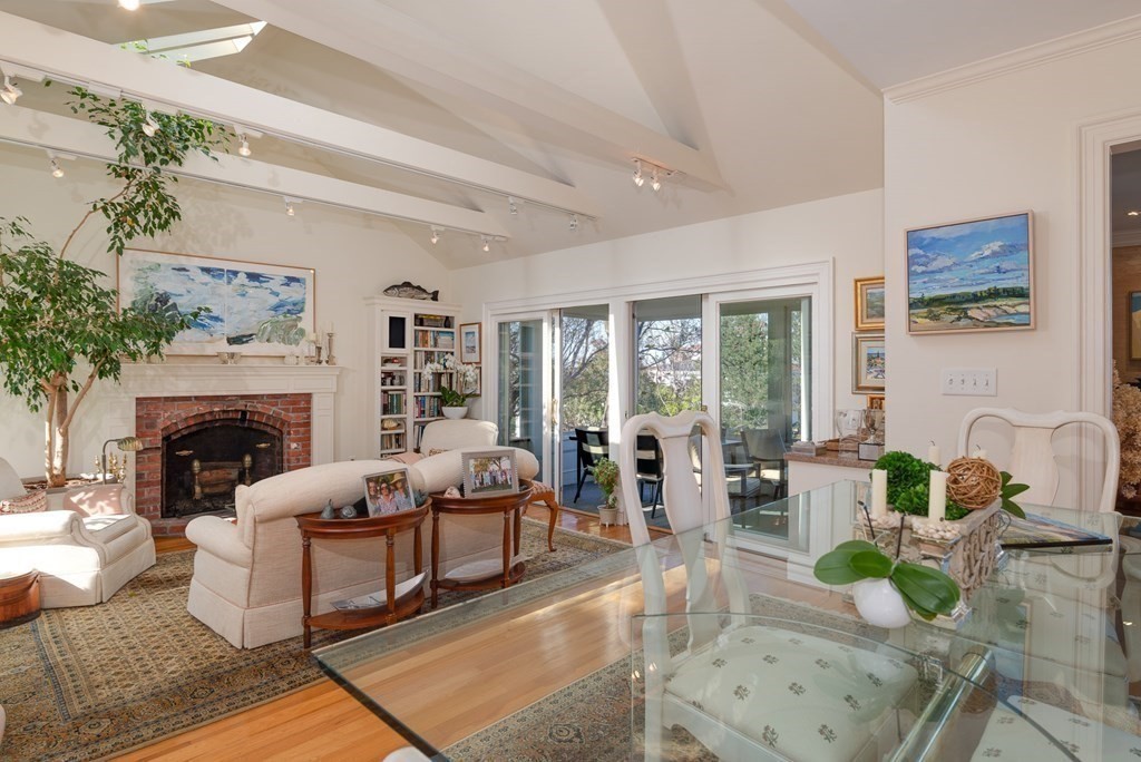 363 Jerusalem Road Cohasset, MA 02025 - Photo 26 of 42 a living room with furniture and a fireplace