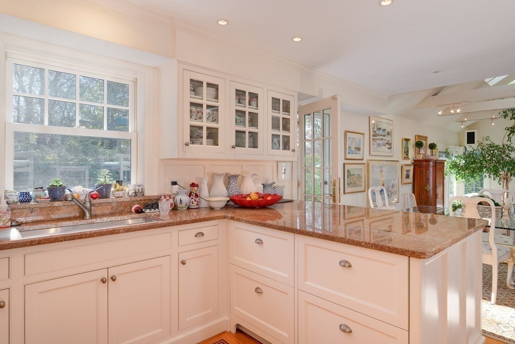 363 Jerusalem Road Cohasset, MA 02025 - Photo 28 of 42 a kitchen with cabinets a sink and appliances