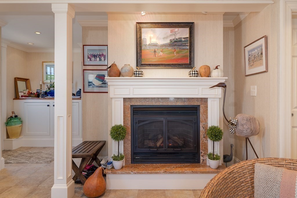 363 Jerusalem Road Cohasset, MA 02025 - Photo 29 of 42 a living room with furniture and a fireplace
