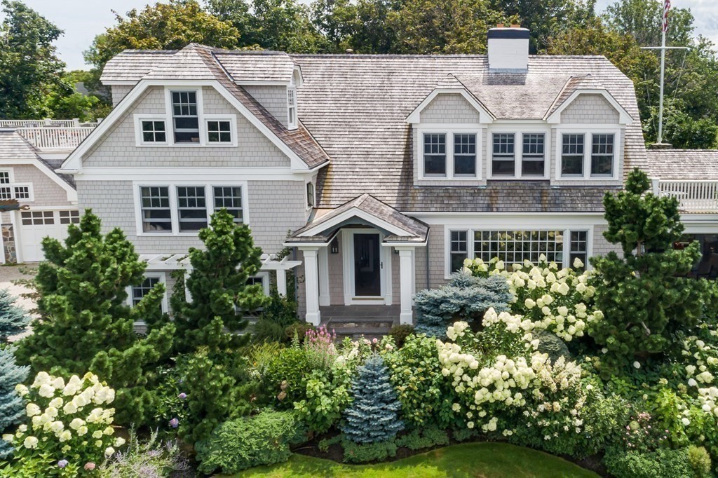 363 Jerusalem Road Cohasset, MA 02025 - Photo 3 of 42 a front view of a house with a yard