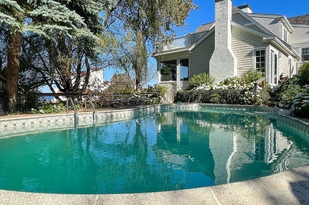 363 Jerusalem Road Cohasset, MA 02025 - Photo 4 of 42 a front view of a house with a yard