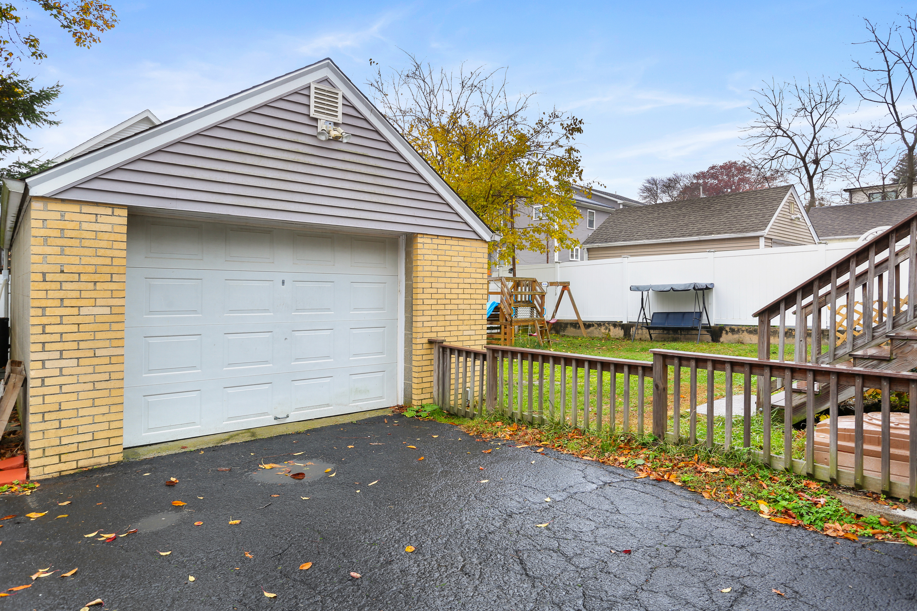 101 Soundview Avenue Fairfield, CT 06825 - Photo 35 of 40 a view of a house with wooden fence