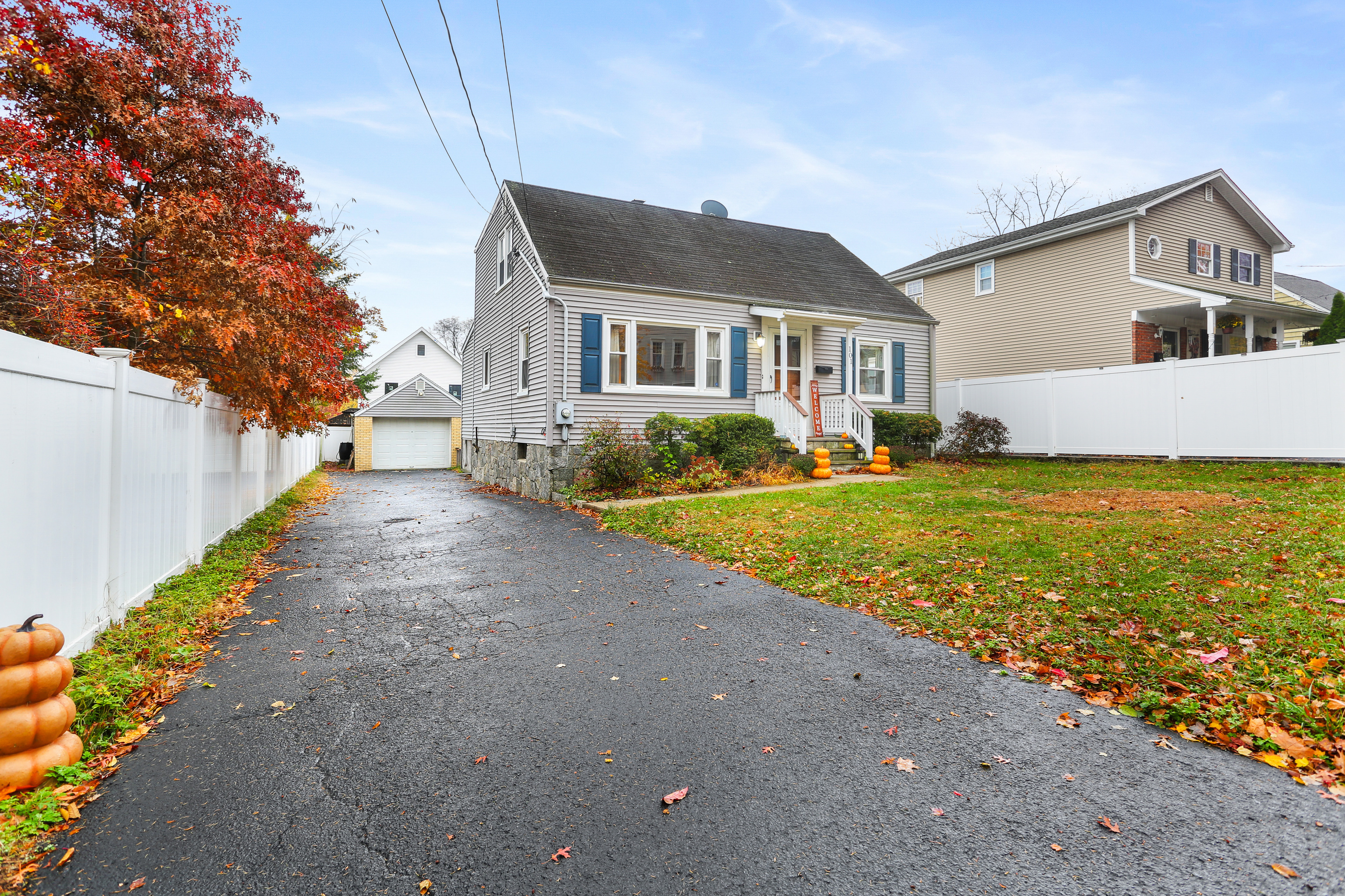 101 Soundview Avenue Fairfield, CT 06825 - Photo 36 of 40 a front view of a house with a yard