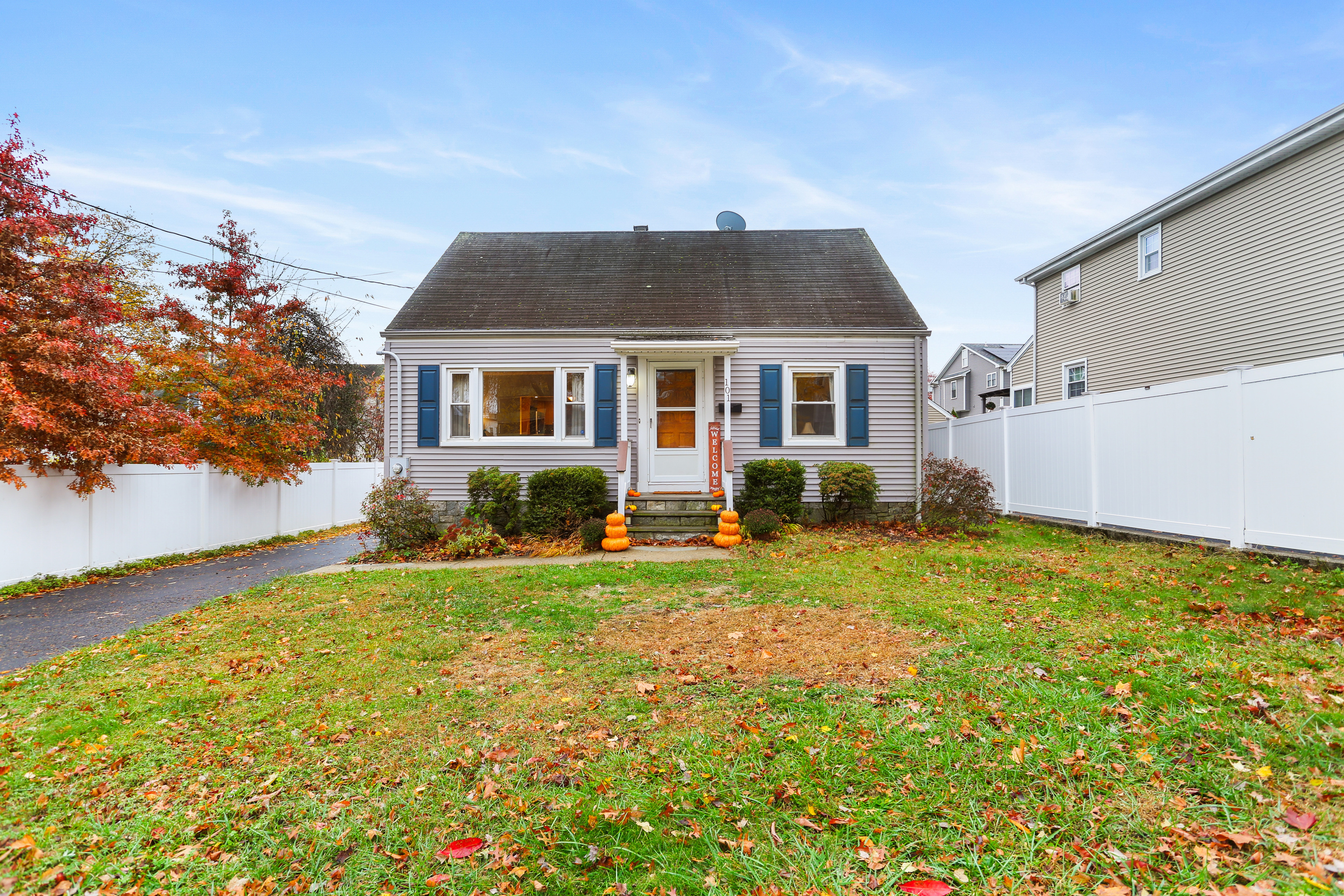 101 Soundview Avenue Fairfield, CT 06825 - Photo 39 of 40 front view of a house with a yard