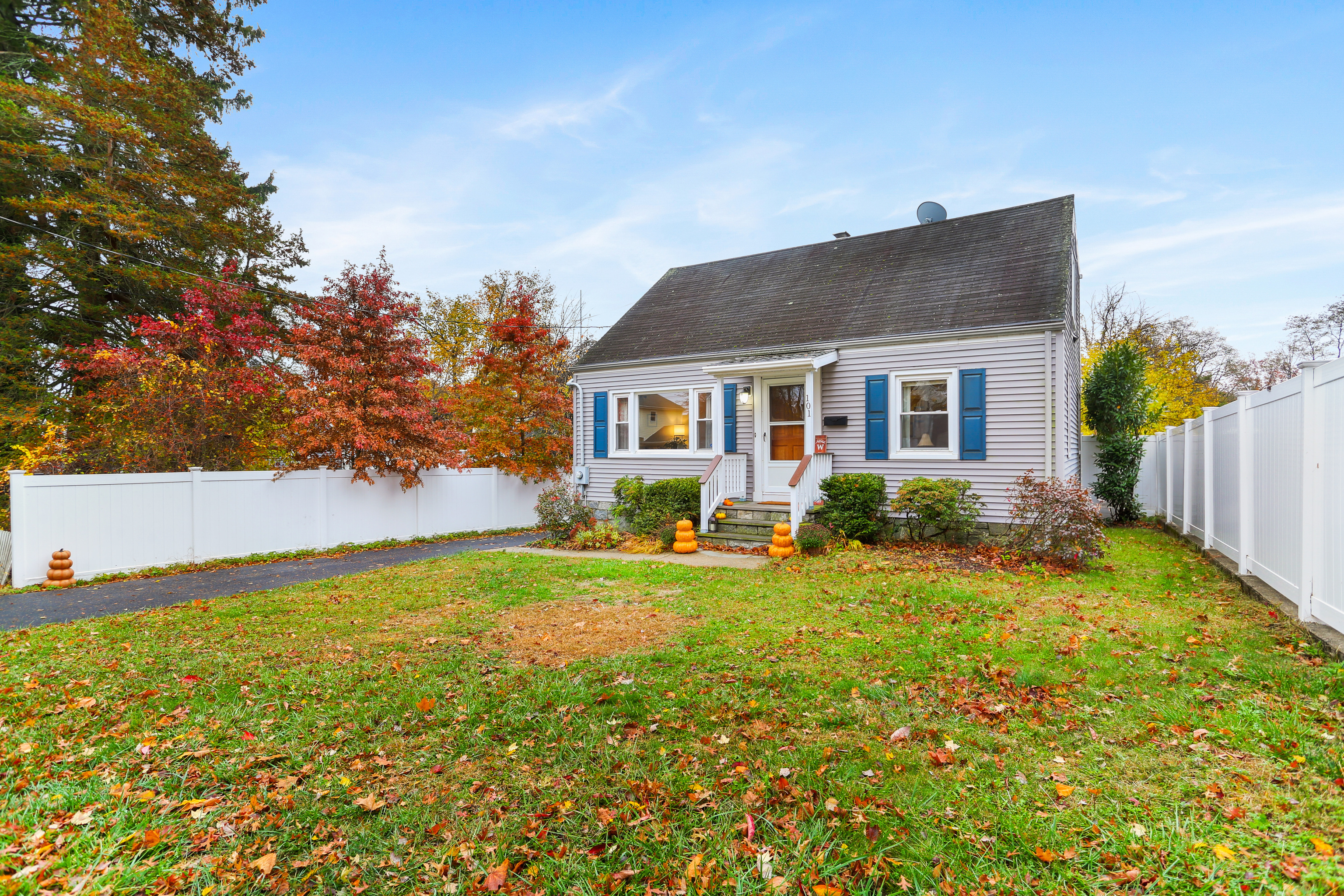 101 Soundview Avenue Fairfield, CT 06825 - Photo 40 of 40 a front view of house with yard and trees