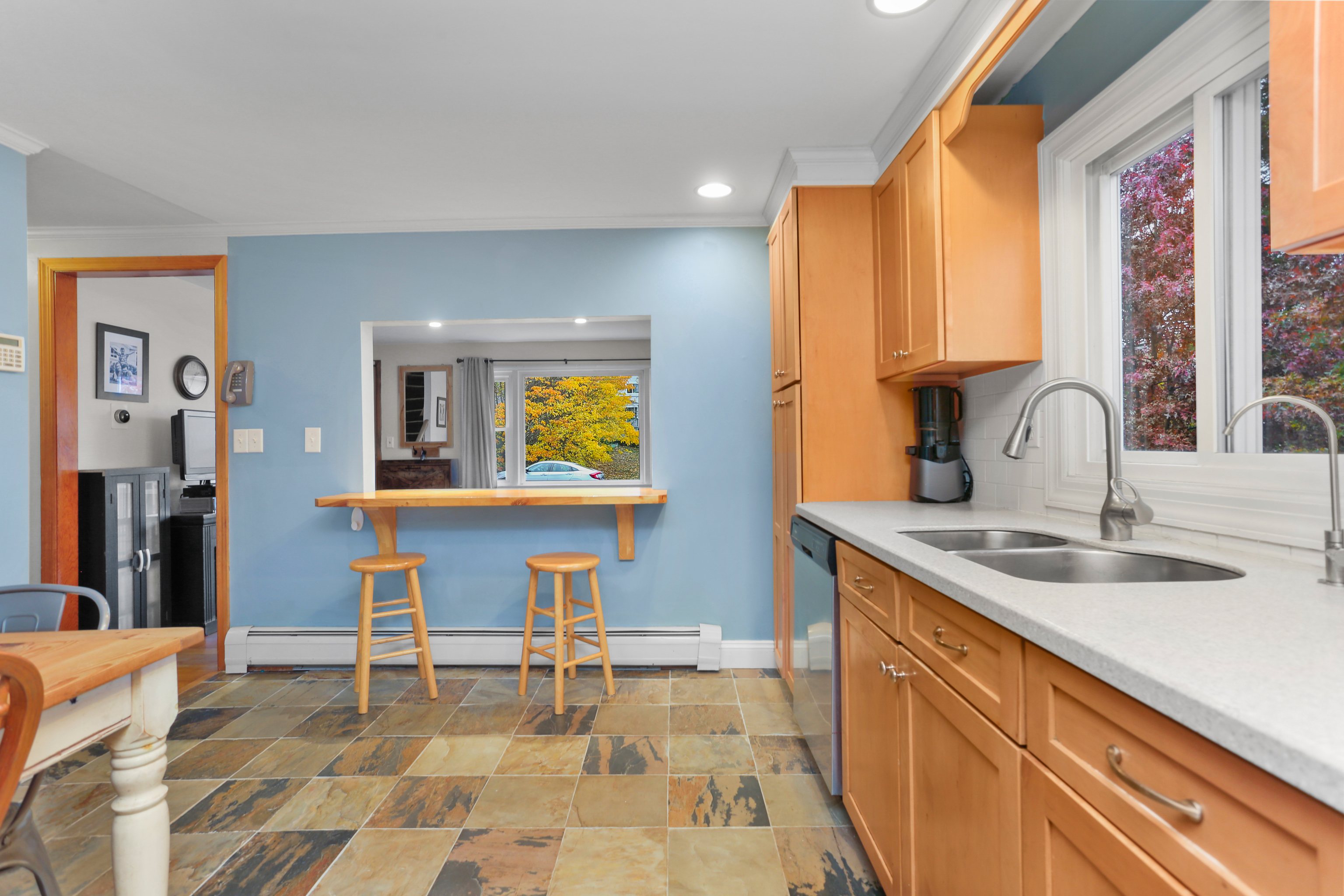 101 Soundview Avenue Fairfield, CT 06825 - Photo 8 of 40 a kitchen with a sink cabinets and window