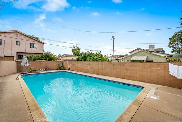 a view of a swimming pool with a lake view