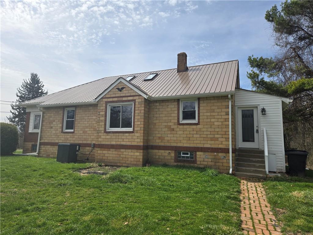 1425 Barclay Hill Road Beaver, PA 15009 - Photo 26 of 30 a front view of a house with a garden
