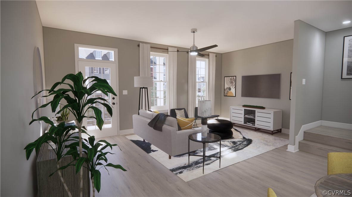 6941 Dunton Road Chesterfield, VA 23832 - Photo 5 of 7 a living room with furniture a chandelier and a flat screen tv