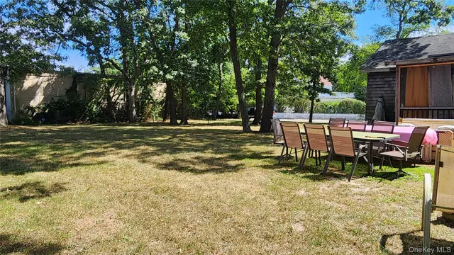 a view of a chairs and tables in the patio