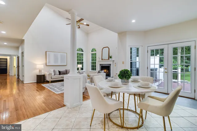 a spacious bedroom with a bed and a couch