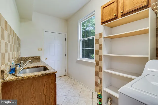 a view of staircase with rug floor