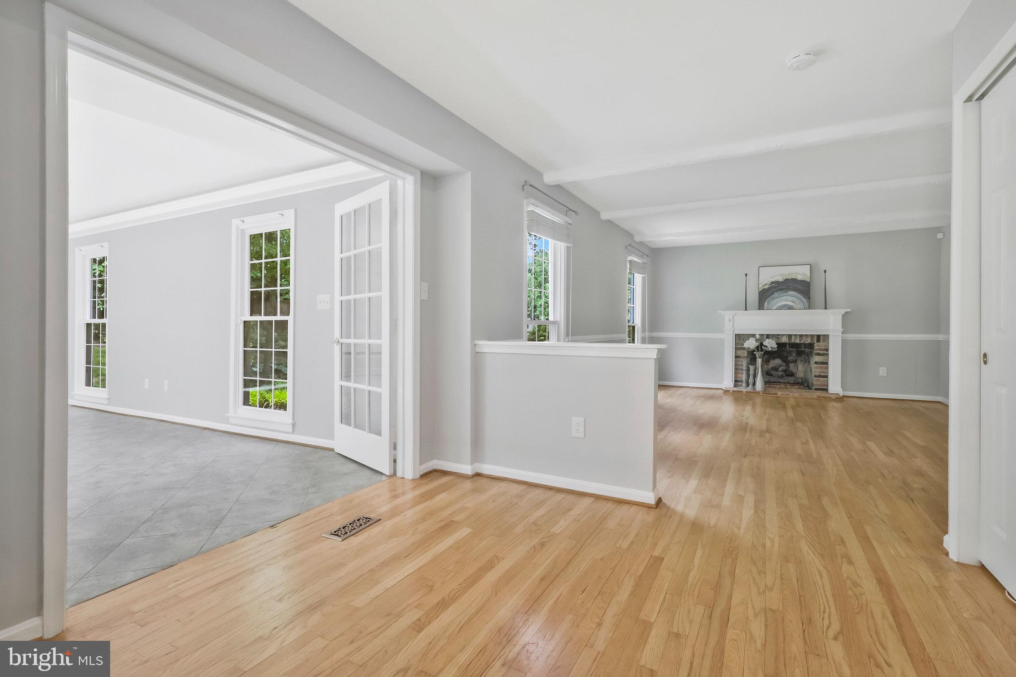 8606 Nanlee Drive Springfield, VA 22152 - Photo 19 of 70 a view of empty room with wooden floor and a window
