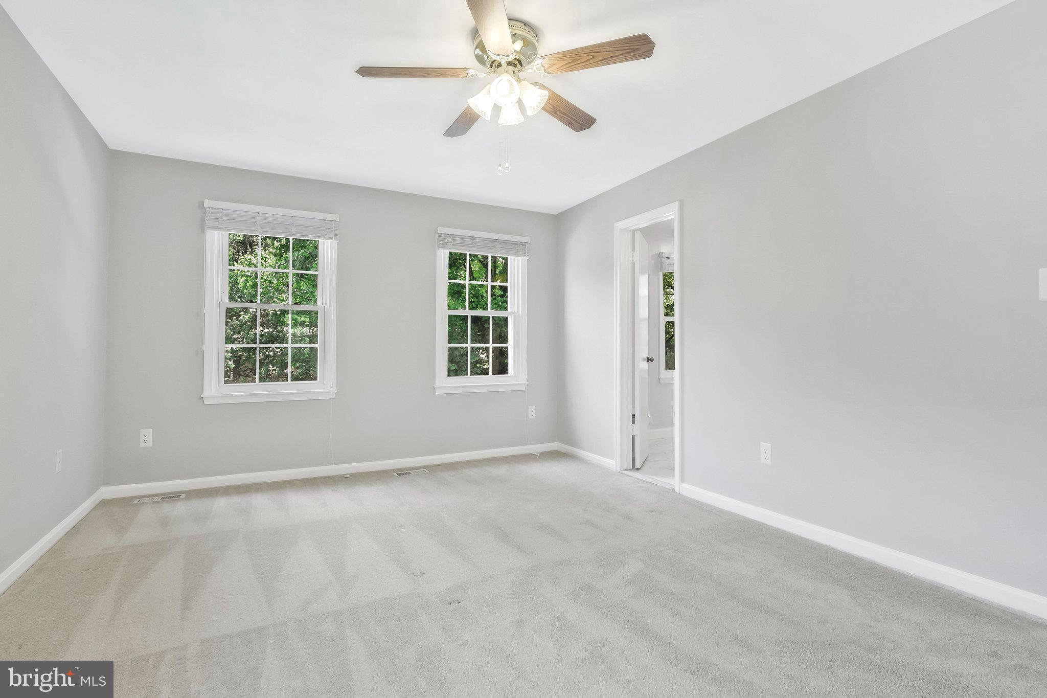 8606 Nanlee Drive Springfield, VA 22152 - Photo 37 of 70 a view of an empty room with a window