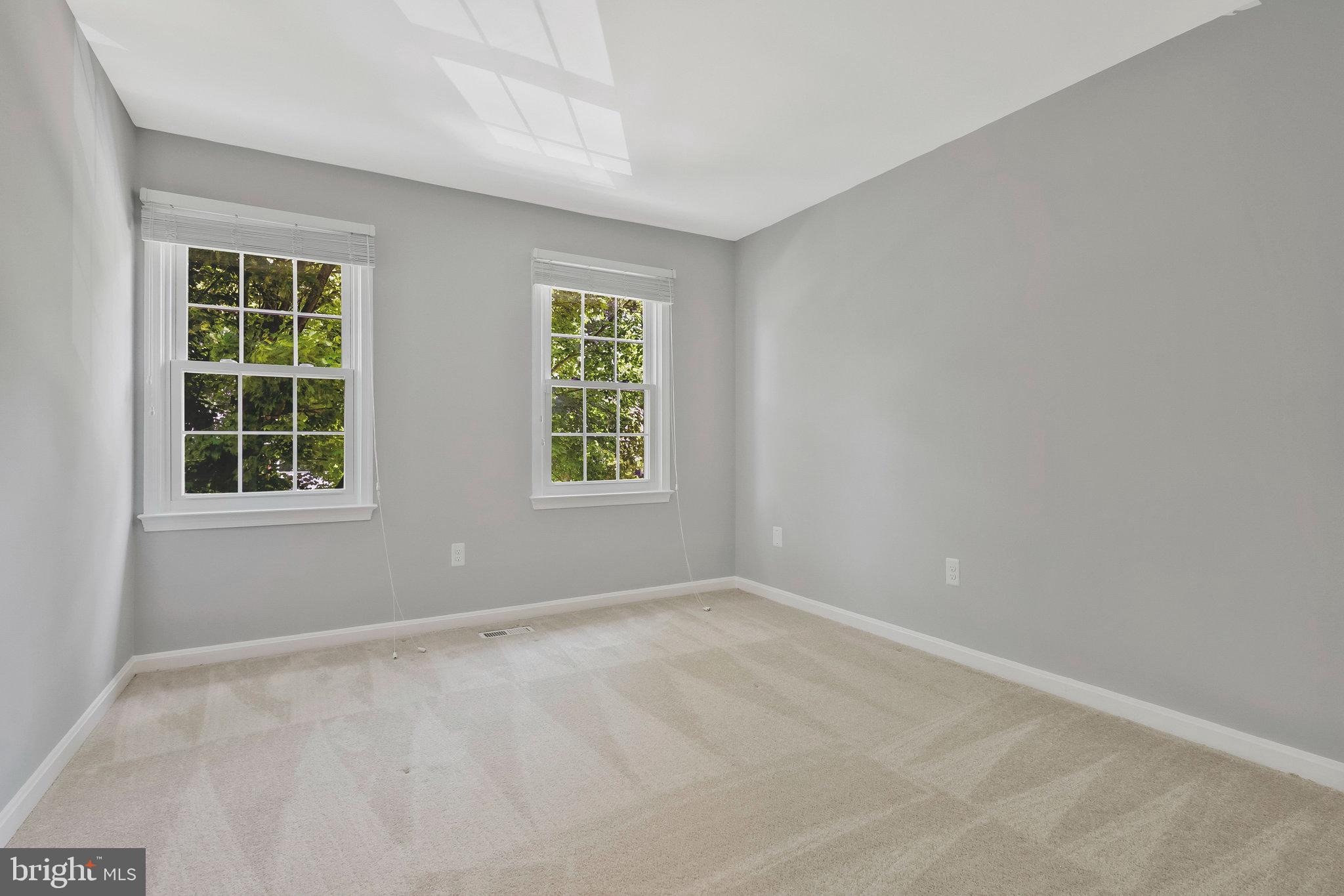 8606 Nanlee Drive Springfield, VA 22152 - Photo 48 of 70 an empty room with windows