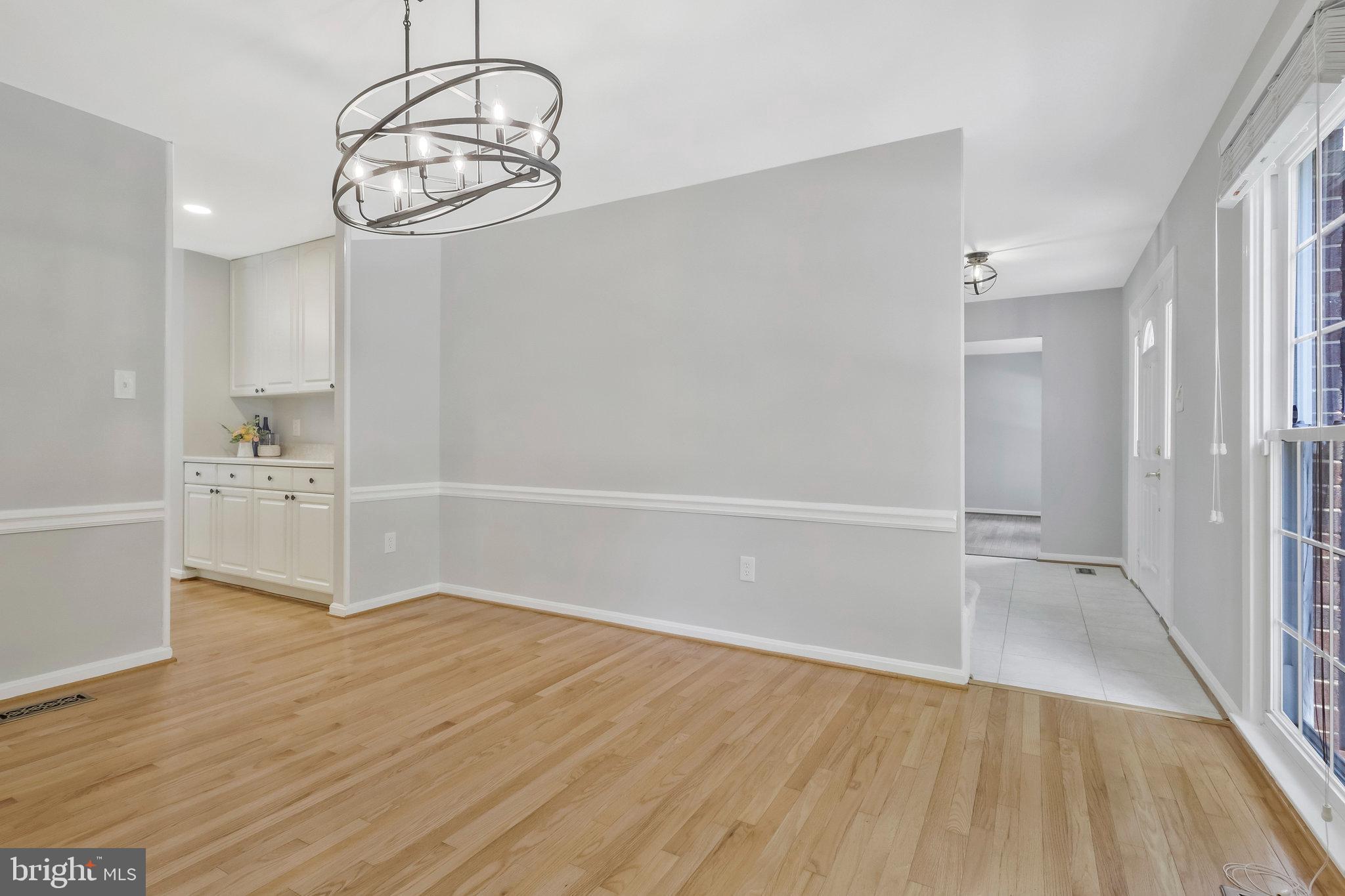 8606 Nanlee Drive Springfield, VA 22152 - Photo 10 of 70 a view of a livingroom with wooden floor