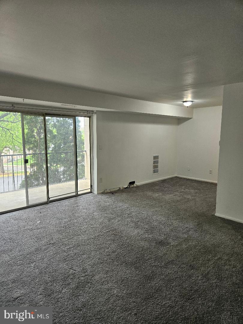 7700 Arehart Drive, Unit 1207 Hyattsville, MD 20784 - Photo 4 of 12 Living Room